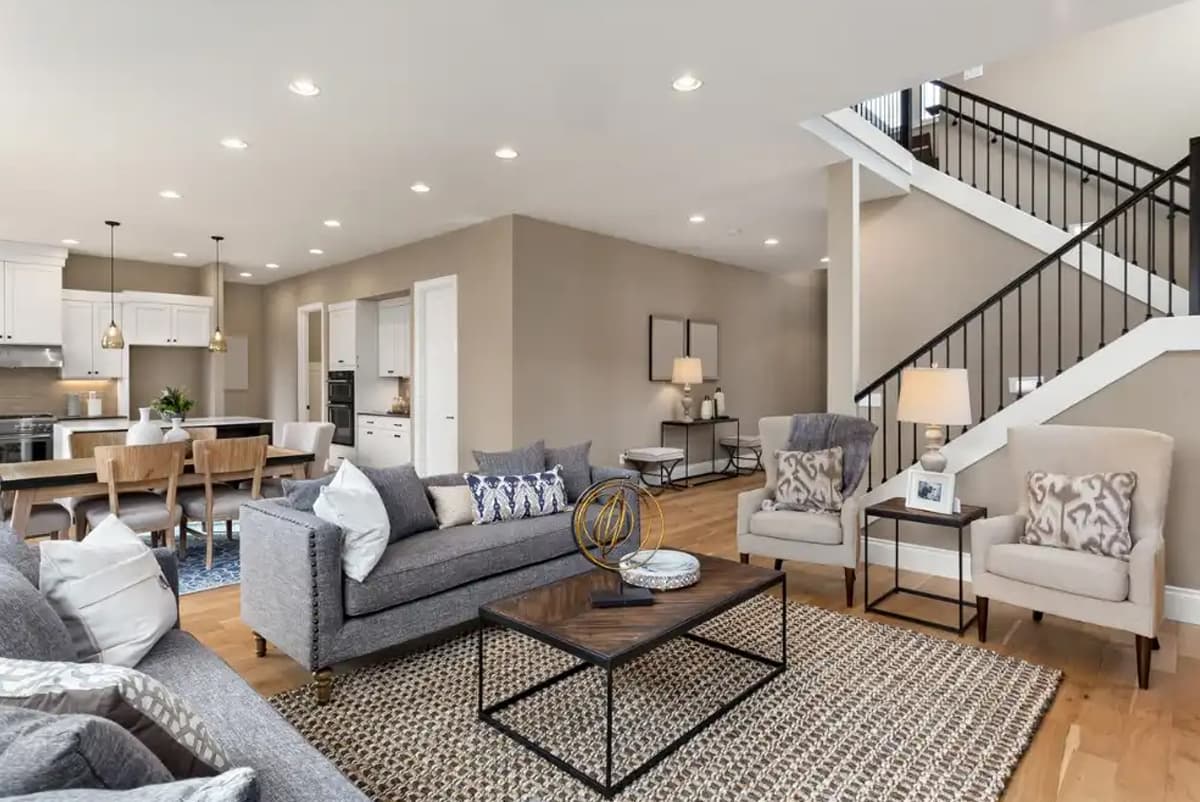 Modern Residence with Open Space Planning of Living, Dining, and Kitchen with Recessed LED Lighting Fixtures.